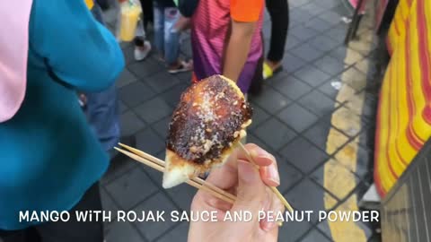 Street night market food handsome guy online mango fruit