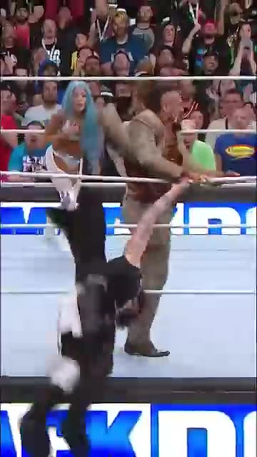 Andrade saves Rey Mysterio