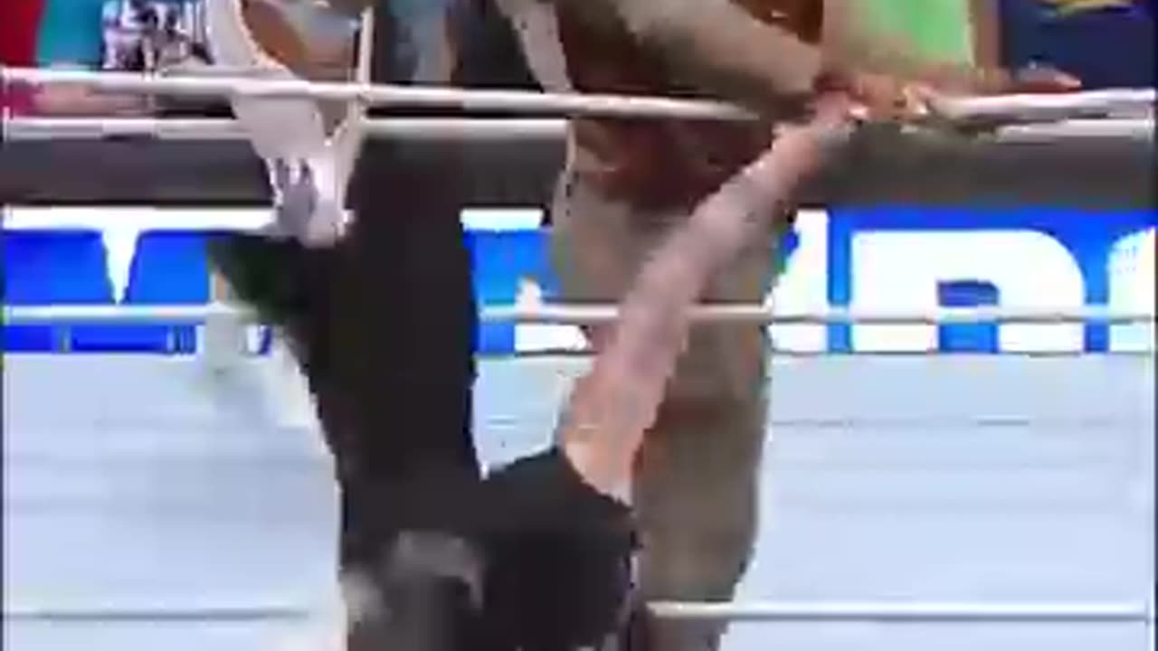 Andrade saves Rey Mysterio