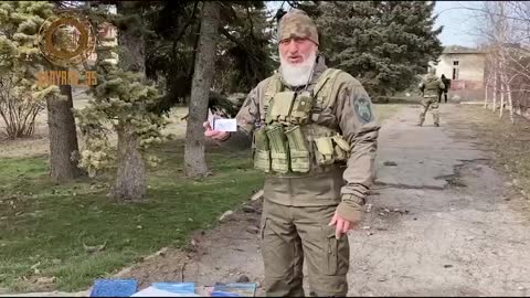 Adam Delimkhanov holds in his hands the certificate of the commander of the so-called Ichkerian platoon, or squad