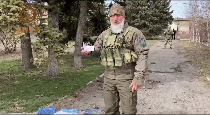 Adam Delimkhanov holds in his hands the certificate of the commander of the so-called Ichkerian platoon, or squad