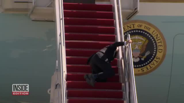 President Biden falls on steps