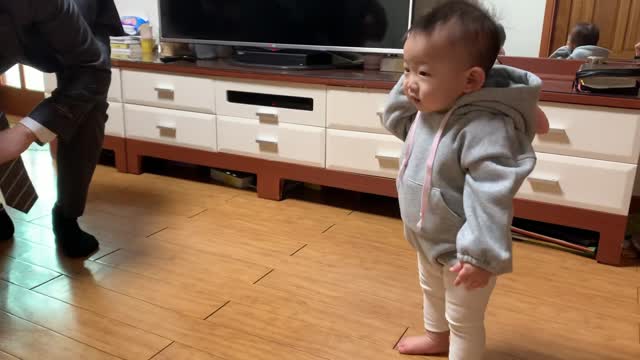 1-year baby is adorably greeting for Happy new year