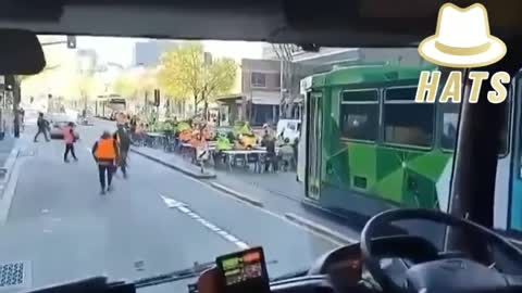 CONSTRUCTION WORKS TAKE LUNCH ON TRACKS OUT OF PROTEST , LOL LOVE IT!