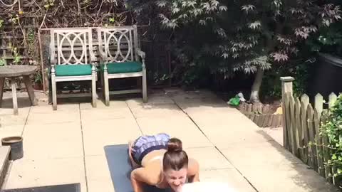 Dogs interrupting yoga practice