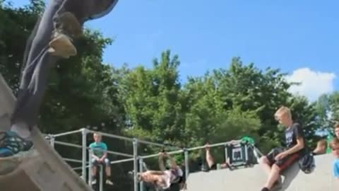 Slowmo blue shirt kid tries to do backflip falls on head