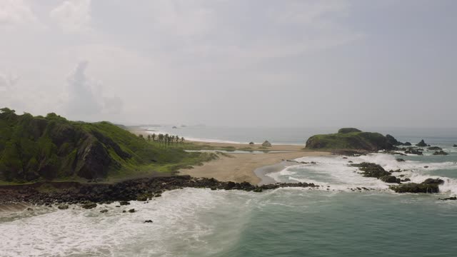 Virgin forlorn ocean side with a palapa