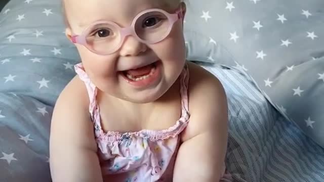 Cute child mocks mom