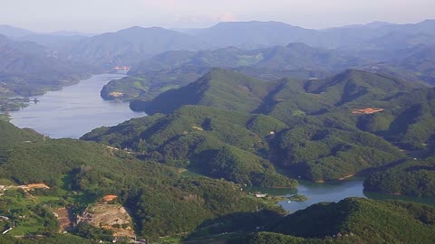 the peaks and lakes seen from high places