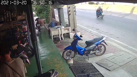 Truck Rolls Under Awning in Thailand