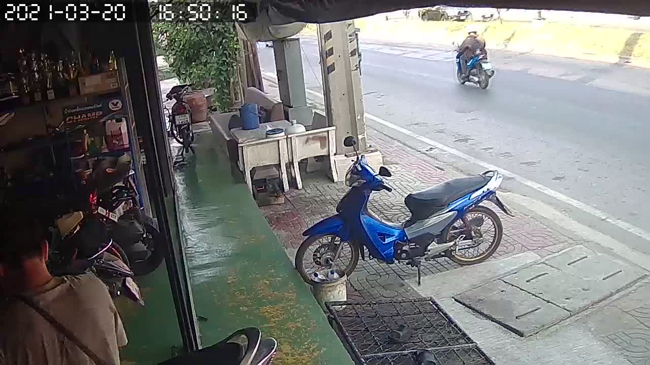 Truck Rolls Under Awning in Thailand