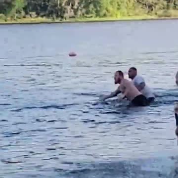 Deadly alligator chases after children as they swim away in terror
