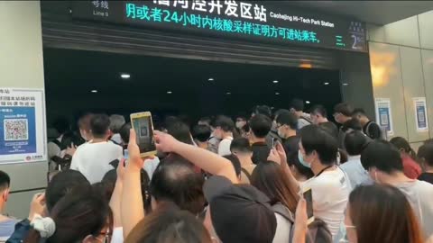 In Shanghai, citizens cannot leave the city unless they have a government-issues green QR code.