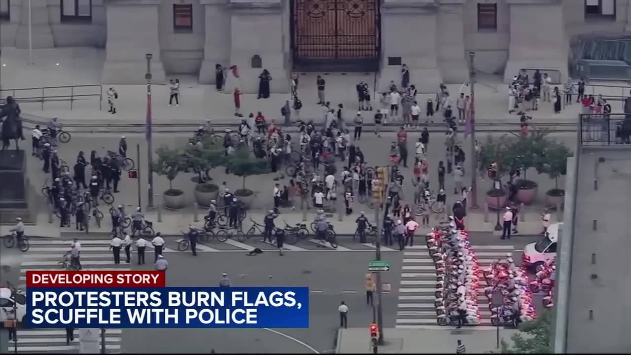 Pro-Palestinian protestors set fire to US flags in front of Philadelphia’s City Hall