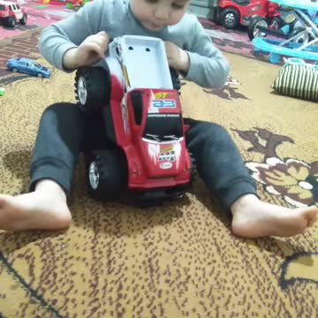 This little boy is not proficient in playing