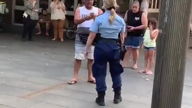 Sydney Australia Police officer swears Infront of a man's child and then pepper spray him