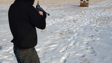 Brian fires the Thompson Gun