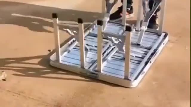 Check out this table that folds up into a suitcase