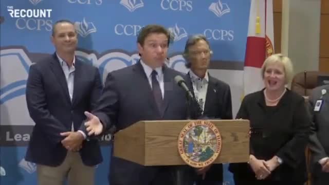 Florida's Governor Ron DeSantis accuses Biden of dividing the country through vaccine mandates