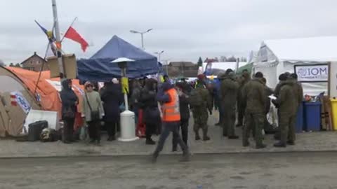 Refugees fleeing Ukraine arrive in Poland Associated Press