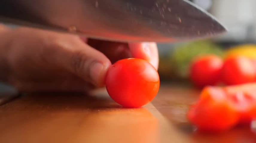 Cut The Cherry Tomatoes In Half