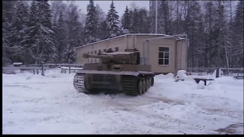 Scratch-built Tiger 1 Tank running in snow, Not a T-34 chassis. Excellent.