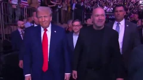 President Donald Trump, Elon Musk and Speaker Mike Johnson walk out to UFC 309