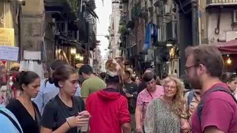 Guy Carries Cat on His Head