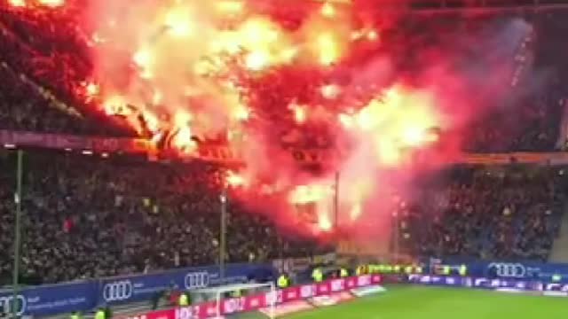 Foot ball stadium burning, playing the game -crazy video