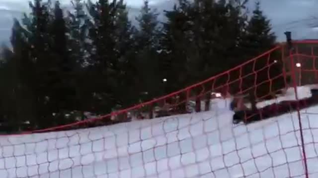 Guy goes for ramp jump snowboard and then freezes and faceplants