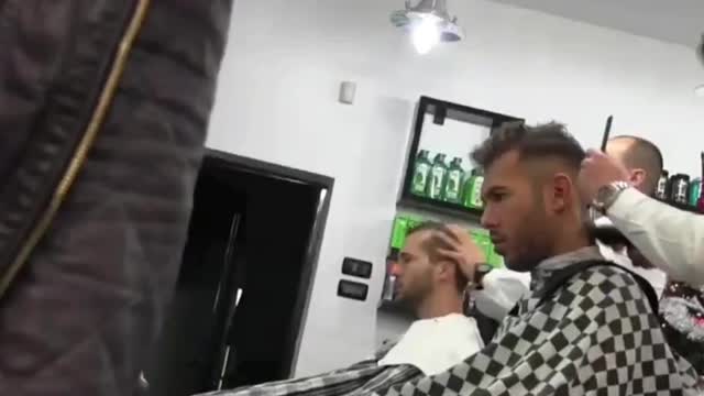 Andrew tate getting a haircut