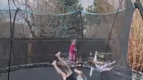 Guy Launches Child Into Air On Trampoline!