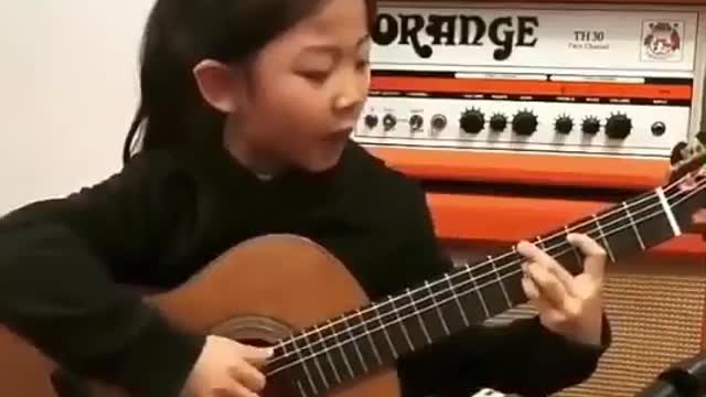 AWESOME Japanese child on GUITAR