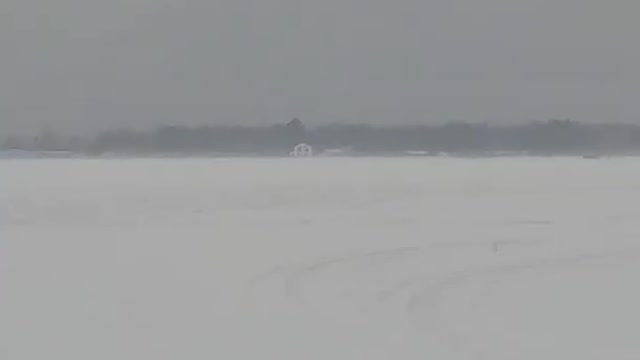 Wind Blows Ice Fishing Shanty Across Lake