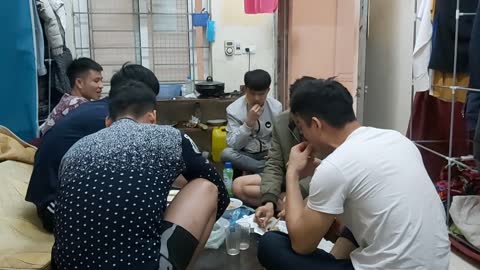 The guys eat rice in Vietnam