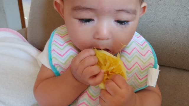 reaction beautiful cut baby trying orange wonder if she liked