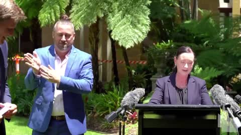 Huntsman spider crawls on Queensland health minister during press briefing