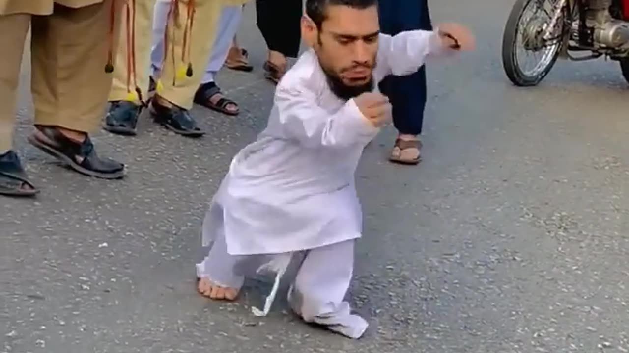 Short men dance