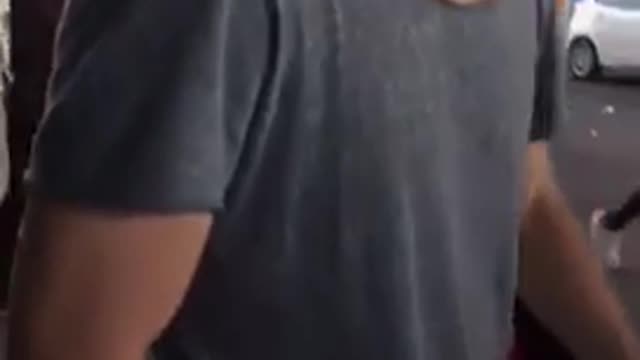 Guy chest bumps friend into chrysler