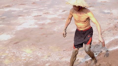 Rescue puppy stuck in mud