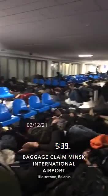 Immigrants waiting at Minsk airport after being denied entry into Polland