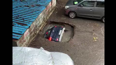 Car Sinks Into Ground In Mumbai Amid Heavy Rainfall