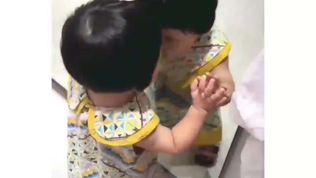 Children's funny drama in front of the mirror