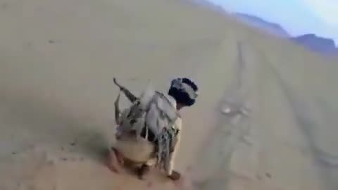 Houthi Fighter Lights Up Cigarette