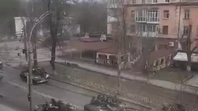 Local residents post video of Russian military armored vehicles in now liberated city Kherson