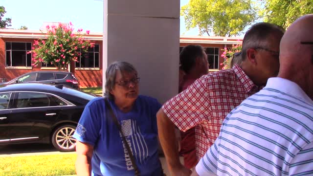Lori Justice let in building 2ND DISTRICT Chair: MELONAIE GULLICK yells about the door being locked