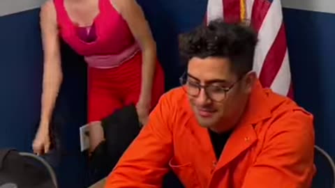 Cop overheats in front of inmate