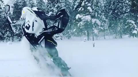 Collab copyright protection - guy falls over snowmobile slowmotion