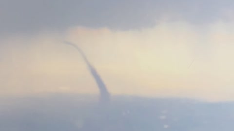 Tornado Captured from Airplane Window