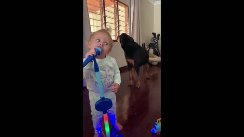 Adorable must see performance by dog and baby